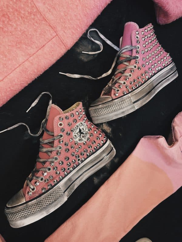 converse nere basse con borchie